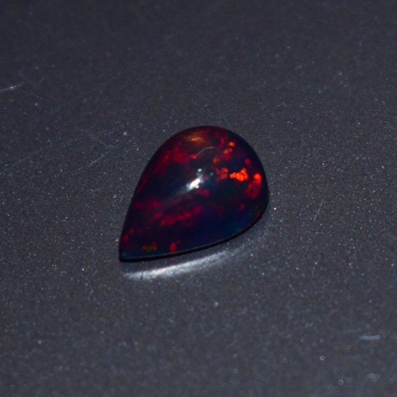 1.35 Cts 7x10 MM Natural Black Ethiopian Opal Cabochon Shape Pear Rainbow Fire Celebrated Opal Welo Fire Smooth Gemstone Opal Cabs Ring