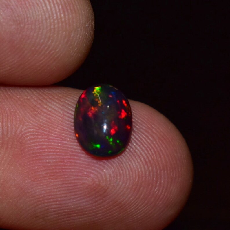 1.35 Cts 7X10 MM Natural Black Ethiopian Opal Cabochon Shape Oval Rainbow Fire Celebrated Opal Welo Fire Smooth Gemstone Opal Cabs Ring