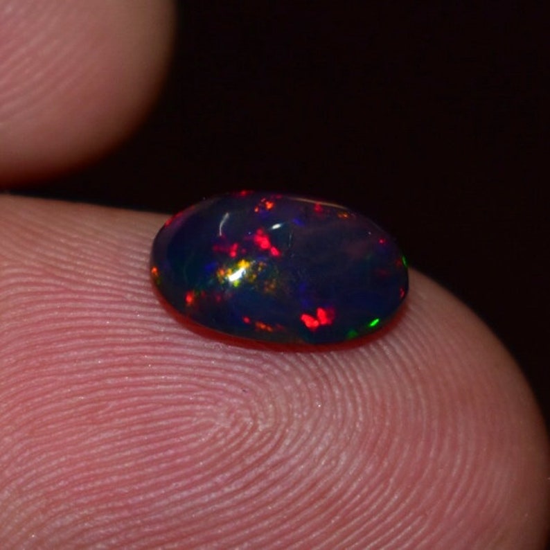 1.35 Cts 7X10 MM Natural Black Ethiopian Opal Cabochon Shape Oval Rainbow Fire Celebrated Opal Welo Fire Smooth Gemstone Opal Cabs Ring