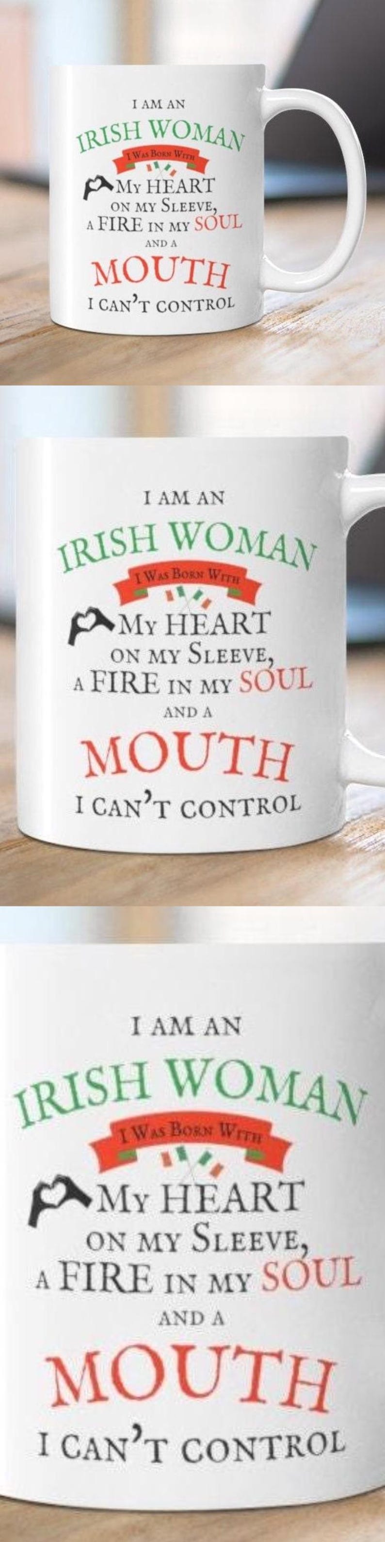 May include: A white ceramic mug featuring the text I AM AN IRISH WOMAN I WAS BORN WITH MY HEART ON MY SLEEVE, A FIRE IN MY SOUL AND A MOUTH I CAN'T CONTROL. The design includes a red banner with the Irish flag and a black heart hand gesture.