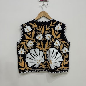 Embroidery Jacket
Suzani Jacket
Sleeveless Jacket
Suzani Vest
Handmade Jacket
Suzani Short Jacket
Indian Jacket
Cotton Jacket
Suzani Vest For Her
Gilet For Women
Floral Jacket
Cotton Waistcoat
Suzani Jacket Coat