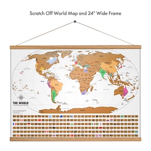 May include: A gold scratch-off world map with flags of the world printed below. The map is framed in a 24-inch wide wooden frame and hangs from a string.