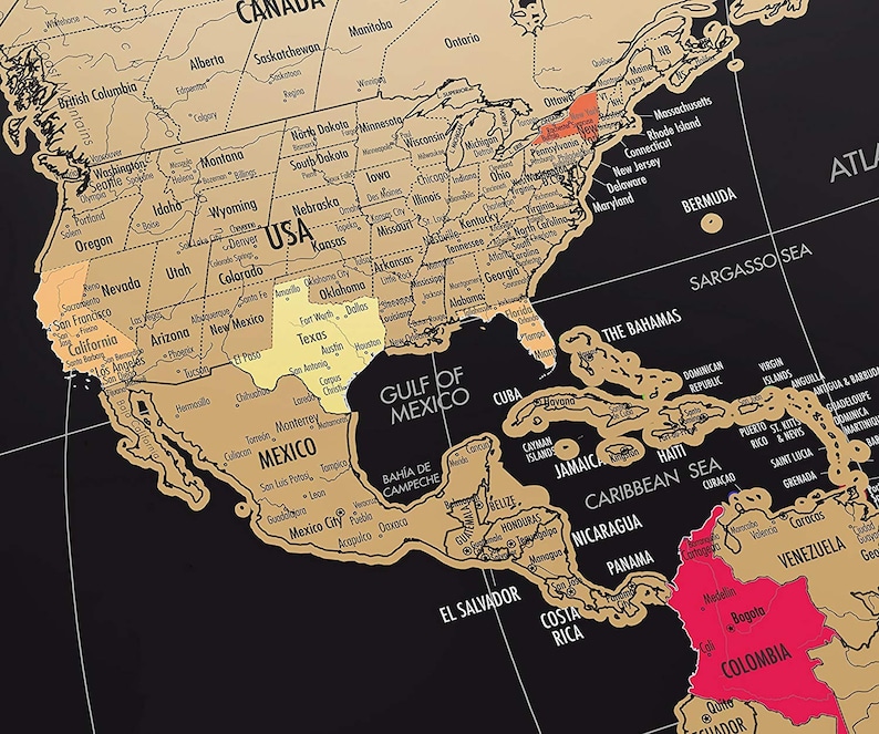 May include: A detailed map of North and South America, with a black background and gold-colored landmasses. The USA, Mexico, and Colombia are highlighted in yellow and red. The map includes country names and geographical features.