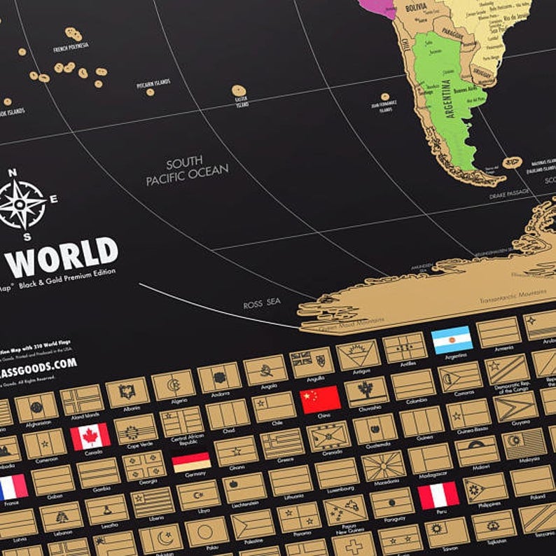 May include: Black and gold world map with flags. The map features a detailed world outline with country flags at the bottom. The text "WORLD Map Black & Gold Premium Edition" is visible.