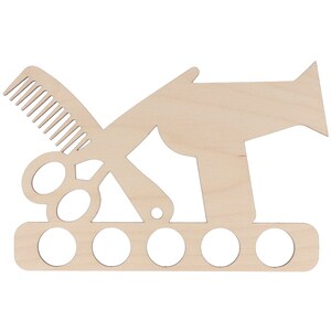 May include: A wooden wall-mounted organizer for hair styling tools. The design features cut-out silhouettes of a comb, scissors, and a hairdryer. It includes five circular holes for holding various items. The wood has a natural, unfinished appearance.