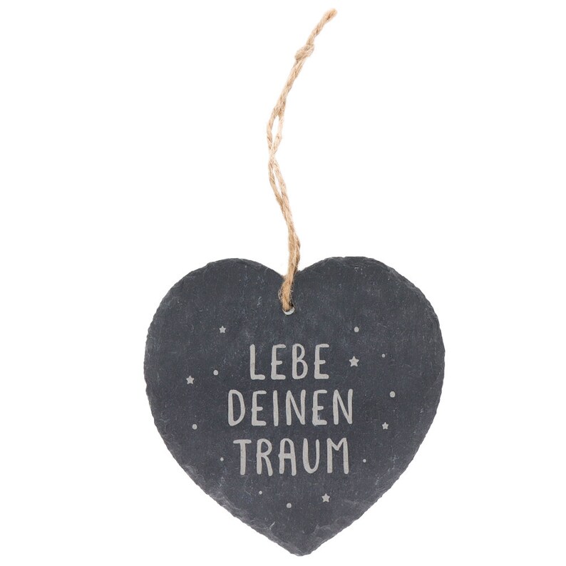 May include: A black heart-shaped slate hanging ornament with a twine string. The slate has the text "LEBE DEINEN TRAUM" written in white.