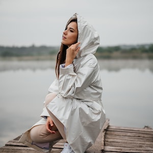Ivory raincoat deals