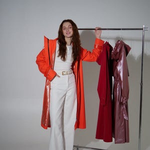 Festival Designer Orange Raincoat for Women | Long Waterproof Hooded Coat | Casual Windbreaker Jacket | Rave Outerwear