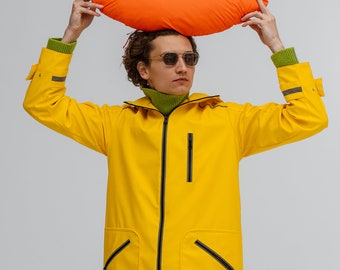 Unisex yellow hooded waterproof raincoat for travel and city