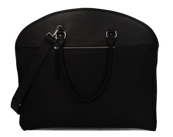 May include: Black leather garment bag with a top handle and a shoulder strap. The bag has a zippered pocket on the front.