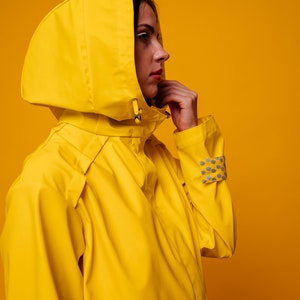 Women&#39;s Bright Yellow Raincoat waterproof coat