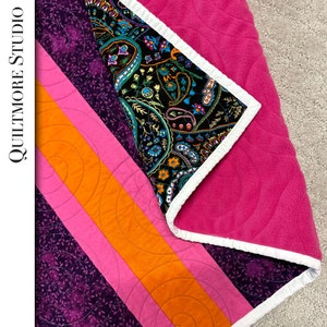 Homemade cotton and fleece lap quilt for sale strip pieced colorful patchwork quilt for children playtime or throw for home décor or nursery