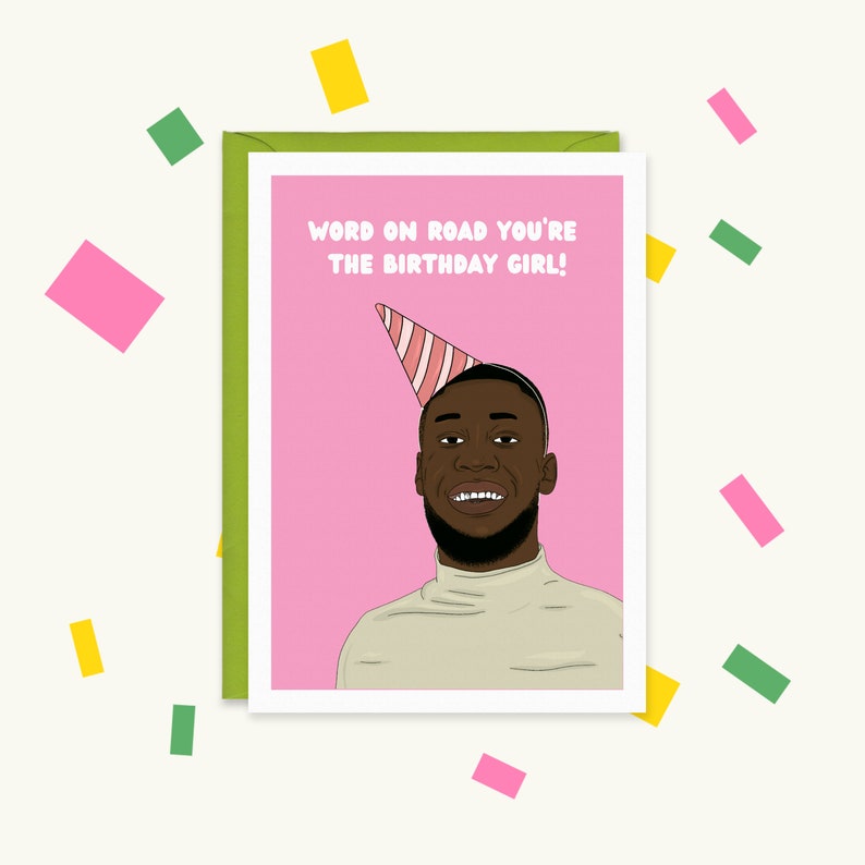 May include: A pink birthday card with a cartoon illustration of a person wearing a party hat. The text on the card reads "Word on road you're the birthday girl!"