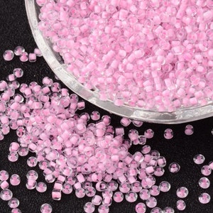 50g 2mm seed beads candy pink (clear exterior) - Beautiful glass beads perfect for beading, crafts & jewellery making.