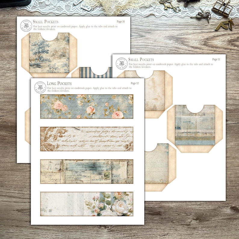 Printable French Country ephemera accordion storage suitcase kit in dusty blue, cream, and blush tones. Includes vintage-inspired suitcase panels, six coordinating folder inserts with toile, damask, and floral designs, matching backing paper, six small pockets, six elegant tags, and three luggage tags. Perfect for organizing and storing journaling supplies, scrapbooking materials, tickets, and keepsakes in a romantic French country style. Digital download for crafting.