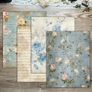 Printable French Country ephemera accordion storage suitcase kit in dusty blue, cream, and blush tones. Includes vintage-inspired suitcase panels, six coordinating folder inserts with toile, damask, and floral designs, matching backing paper, six small pockets, six elegant tags, and three luggage tags. Perfect for organizing and storing journaling supplies, scrapbooking materials, tickets, and keepsakes in a romantic French country style. Digital download for crafting.