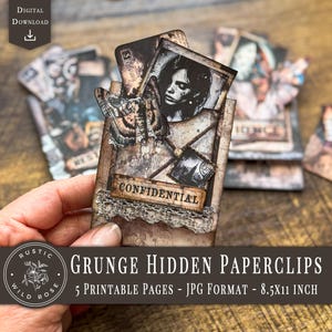 May include: A handmade grunge paperclip with a vintage aesthetic. The paperclip features a small photo, a moth, and the word "CONFIDENTIAL". The design includes lace trim and a weathered appearance. The image also includes the text "GRUNGE HIDDEN PAPERCLIPS - 5 PRINTABLE PAGES - JPG FORMAT - 8.5x11 INCH".