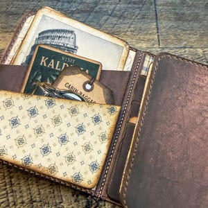 Printable traveler's wallet kit with vintage ephemera and antique maps for journaling.