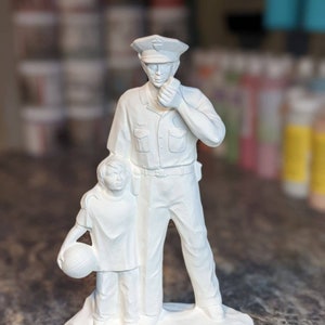 Policeman With Child Doc Holliday Ceramic Bisque 2001