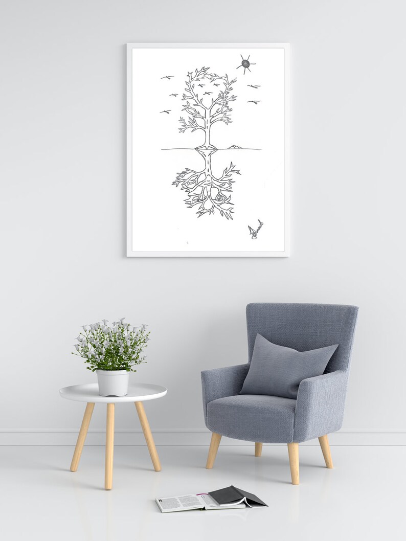 May include: A black and white line drawing of a tree with roots and birds flying above. The drawing is framed and hanging on a white wall above a gray armchair and a white side table with a potted plant.