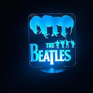 The Beatles 7 Color LED Color Changing Laser Cut Acrylic Lamp.