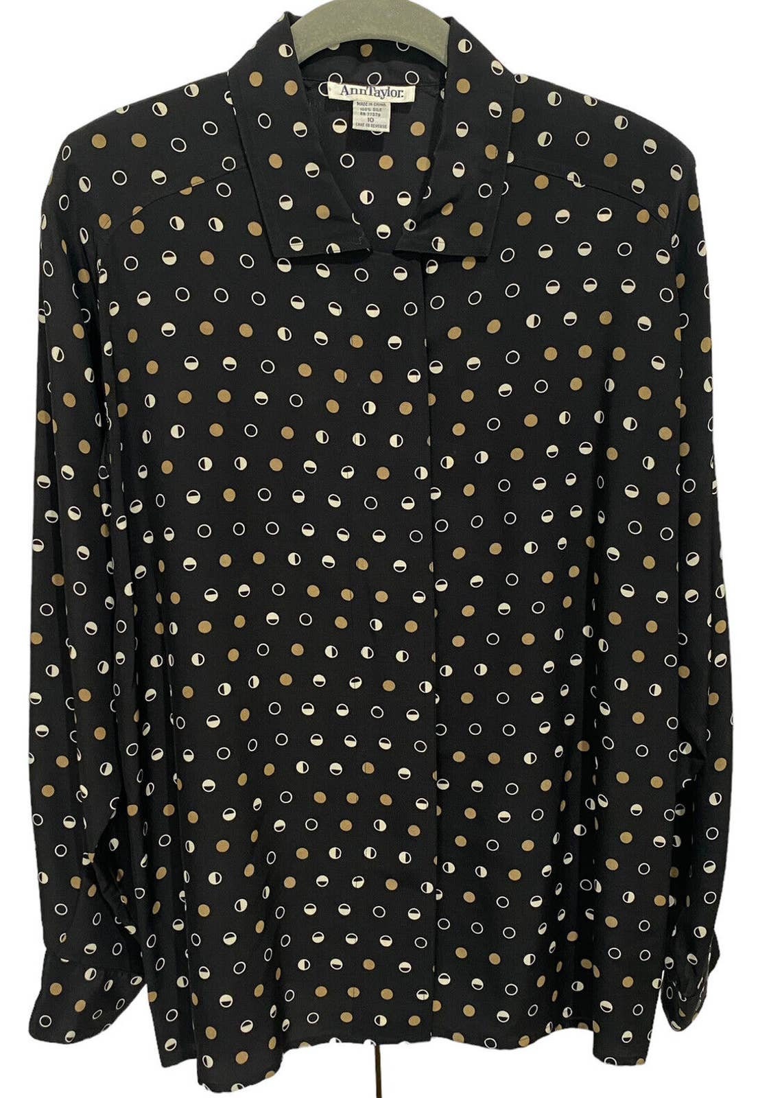 black blouse with gold polka dots