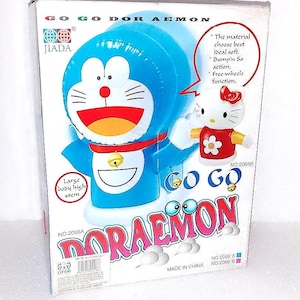 Muñeca inflable maxi DORAEMON bailando y sonido en caja ko china Muñeca inflable de los 90 Música y movimiento nueva