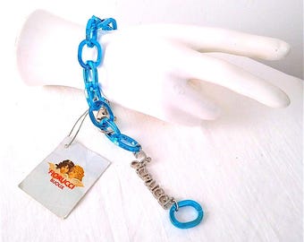 FIORUCCI jaren 90 Italië prachtige blauwe schakelarmband met bedeltjes, nieuw met label - vintage zeldzame blauwe schakelarmband met bedeltjes, in perfecte staat.