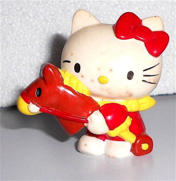 HELLO KITTY 80s Sanrio Japan rare pocket pvc figure rocking horse - mini pvc doll character with rocking horse