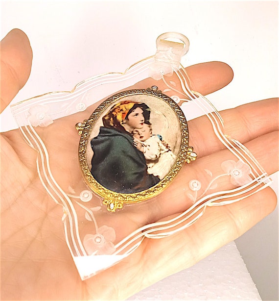 beautiful hanging frame in lucite plastic decorated with image of Madonna with baby Jesus 60s Italy