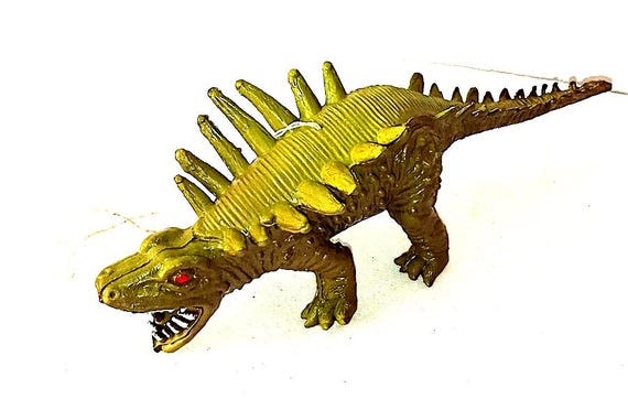 DINOSAUR - MONSTER chinasaur kaiju 70s HK hard rubber figure with elastic