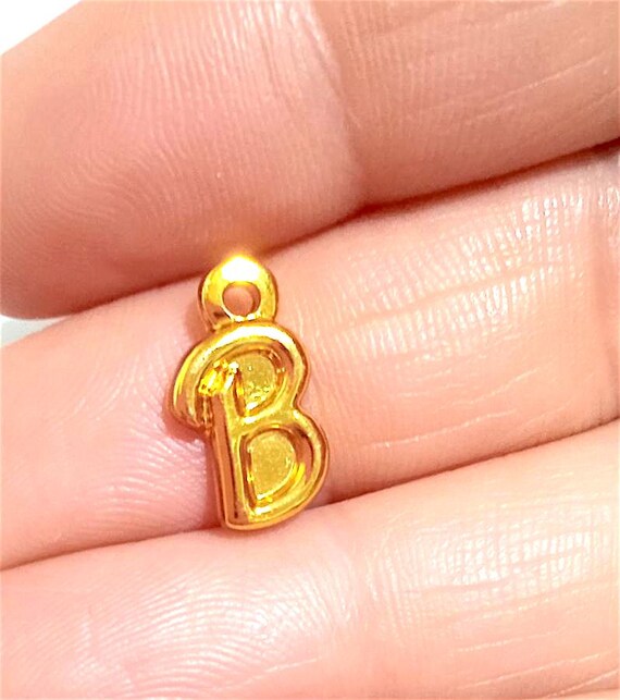 B861 - BARBIE HAIRPLAY 1993 ciondolo pendant telefono argentato plastica