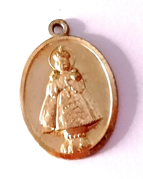 Baby Jesus protect you - jesus child 70s pendant medal in gold tin souvenir religious