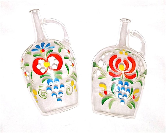 Pair of beautiful small oil and vinegar bottles in blown glass with hand painted flowers from the 60s