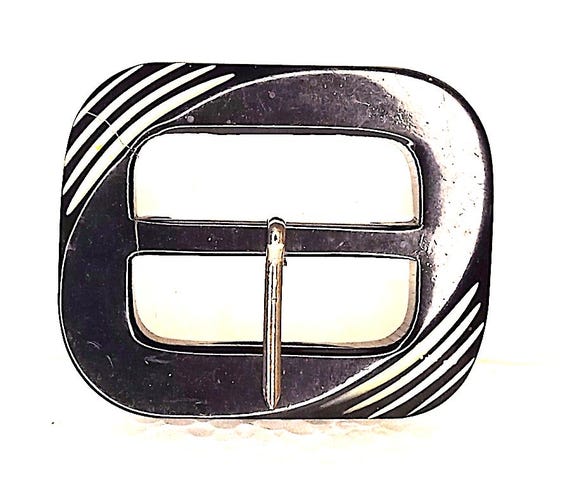 beautiful 1930's bakelite belt buckle decorated in black and white
