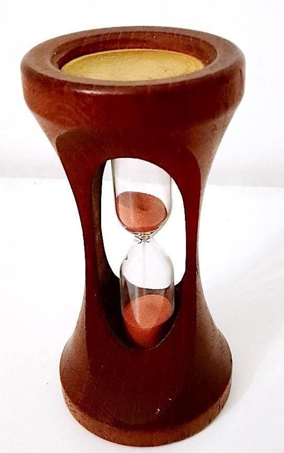 Vintage 70s wood hourglass with golden token coins