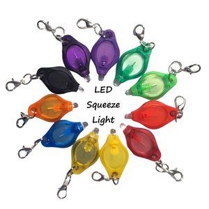 Mini Squeeze Light Keychain - Ultra Bright LED Flashlight with your choice of clasp and/or keychain (White Light)