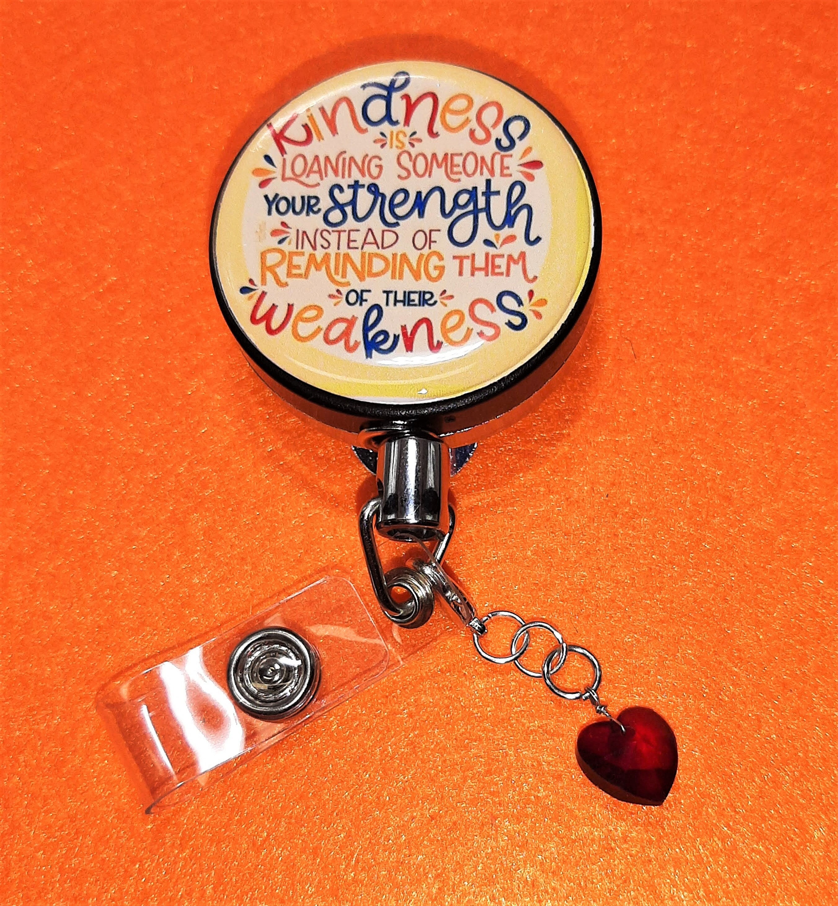 Kindness is Loaning Someone Your Strength Badge Reels or