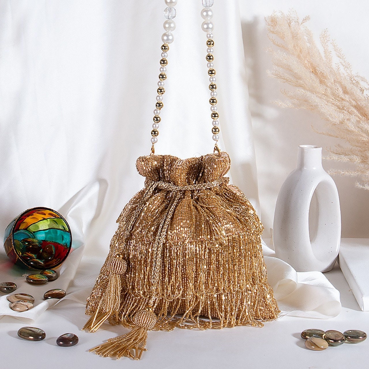 Golden potli store bags online