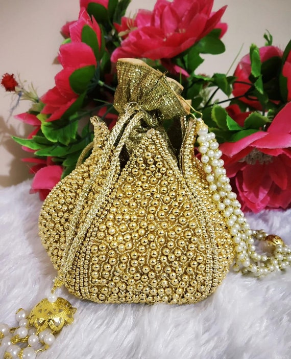 Casual Silk Golden Potli Bag at Rs 99/piece in Varanasi | ID: 21751292588