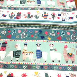 May include: A teal and white fabric featuring rows of patterned designs. The top and bottom rows have llamas wearing sweaters and accessories. The middle rows have cacti, yarn, and hearts. The fabric is likely for crafting or home decor.