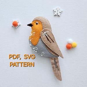 May include: PDF and SVG pattern for a felt robin with a gray body, orange breast, and brown wings. The pattern includes the text "PDF, SVG PATTERN".