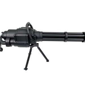 May include: A black plastic toy machine gun with a folding handle and a tripod stand.