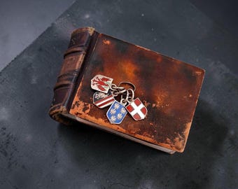 Four Vintage Tiny Austria Coat Charms