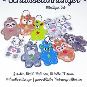 May include: A set of 10 colourful keychains featuring various animal and monster designs. The keychains are made of felt and have embroidered details. The text "Schlüsselanhänger" and "10teiliges Set" is visible in the image.