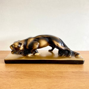 Large Vintage French Art Deco Sculpture of Panther in Black and Gold, Sculpture in Painted Plaster