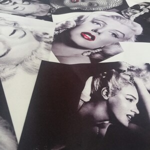 May include: A collage of black and white photographs of a woman with red lipstick. The photographs are arranged in a random pattern and the word "Lovely" is printed in white at the bottom of the image.
