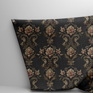 May include: Black fabric with a repeating floral damask pattern in shades of brown, gold, and red. The fabric is draped, showing the detailed design and texture. The pattern features ornate floral and scroll elements.