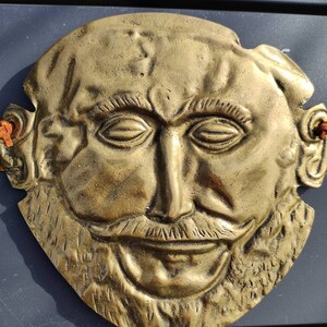 Ancient Greek Mycenaean mask of King Agamemnon in relief, in bronze with gilded patina, handmade in Greece. Height 15 cm