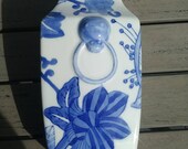 Asian Artisanal Art. Asian vase. Amphora form. Ceramic. Floral motifs with shades of blues. High. 25 cm. Like new
